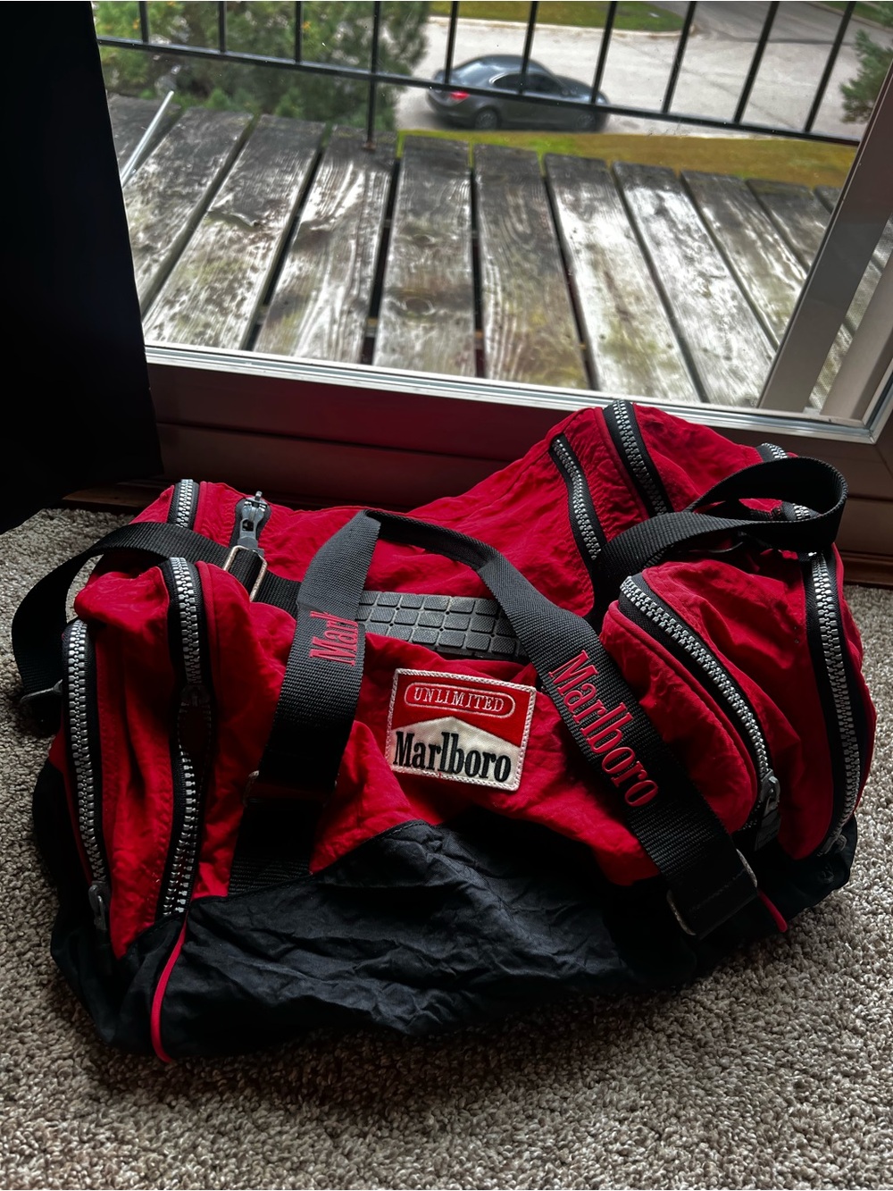 Marlboro Red and Black Duffel with Branded Straps